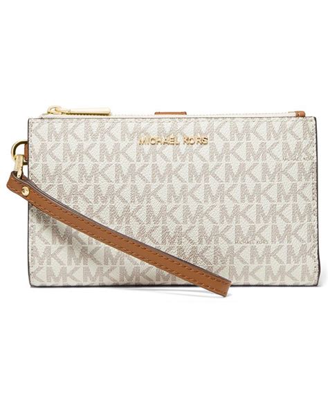 michael kors jet set wristlet|More.